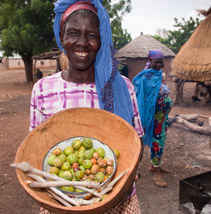 A woman with her harvest